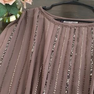 Sequin and beaded blouse by Jennifer Lopez